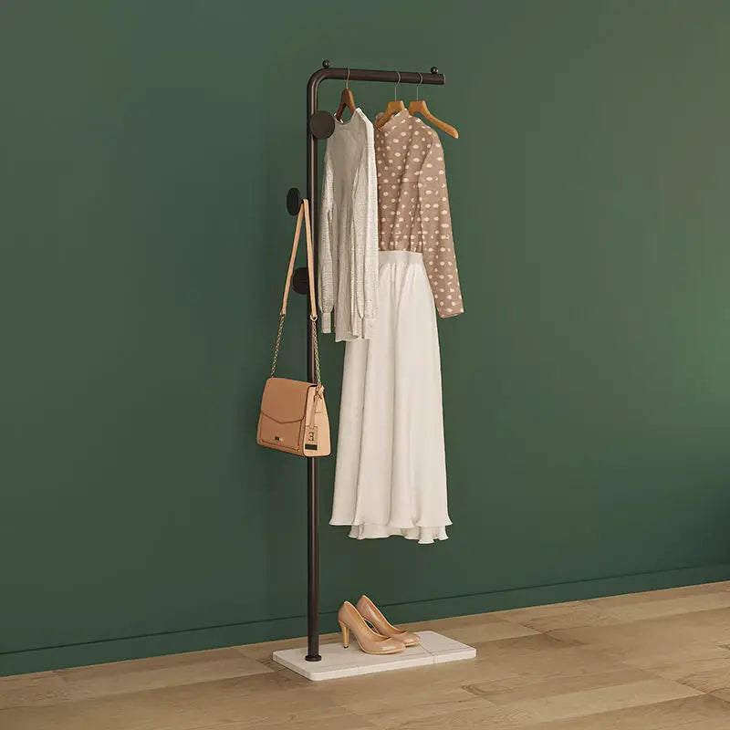 Space-Saving Gold Clothes Rack. Modern Home Organiser