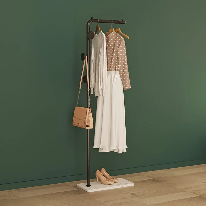 Space-Saving Gold Clothes Rack. Modern Home Organiser