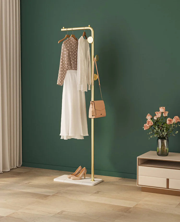 Space-Saving Gold Clothes Rack. Modern Home Organiser