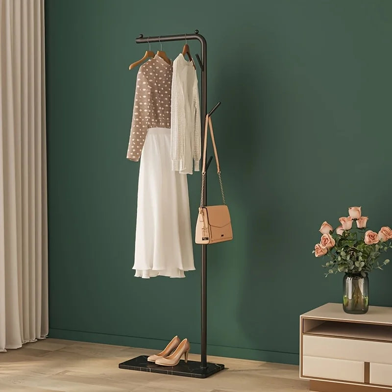 Space-Saving Gold Clothes Rack. Modern Home Organiser