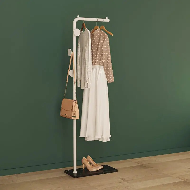 Space-Saving Gold Clothes Rack. Modern Home Organiser