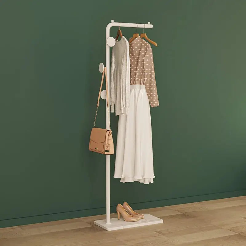 Space-Saving Gold Clothes Rack. Modern Home Organiser