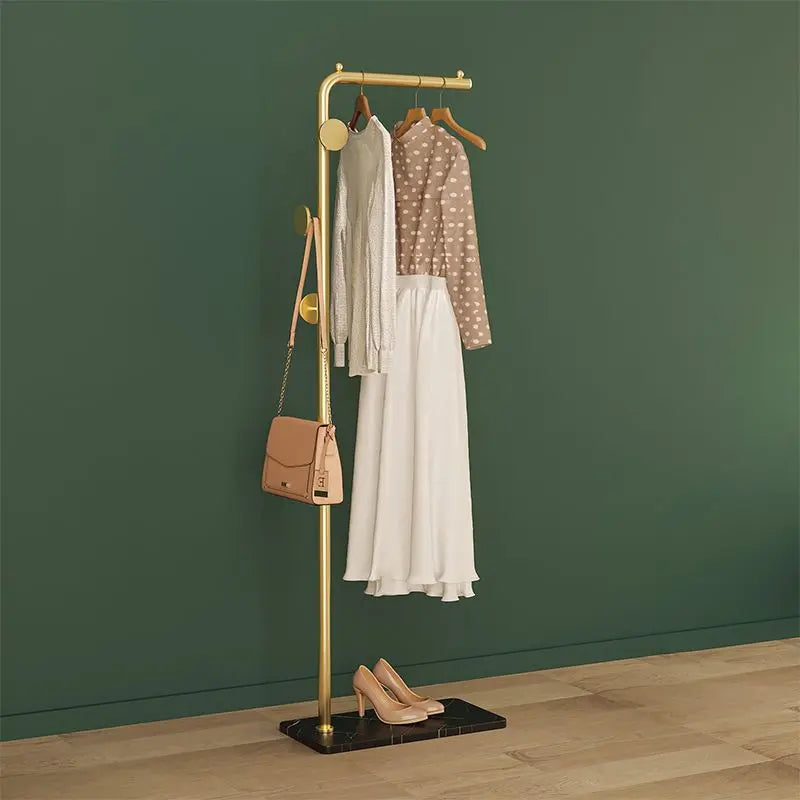 Space-Saving Gold Clothes Rack. Modern Home Organiser