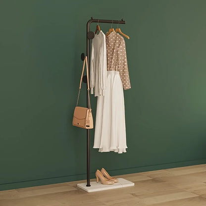 Space-Saving Gold Clothes Rack. Modern Home Organiser