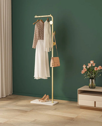 Space-Saving Gold Clothes Rack. Modern Home Organiser
