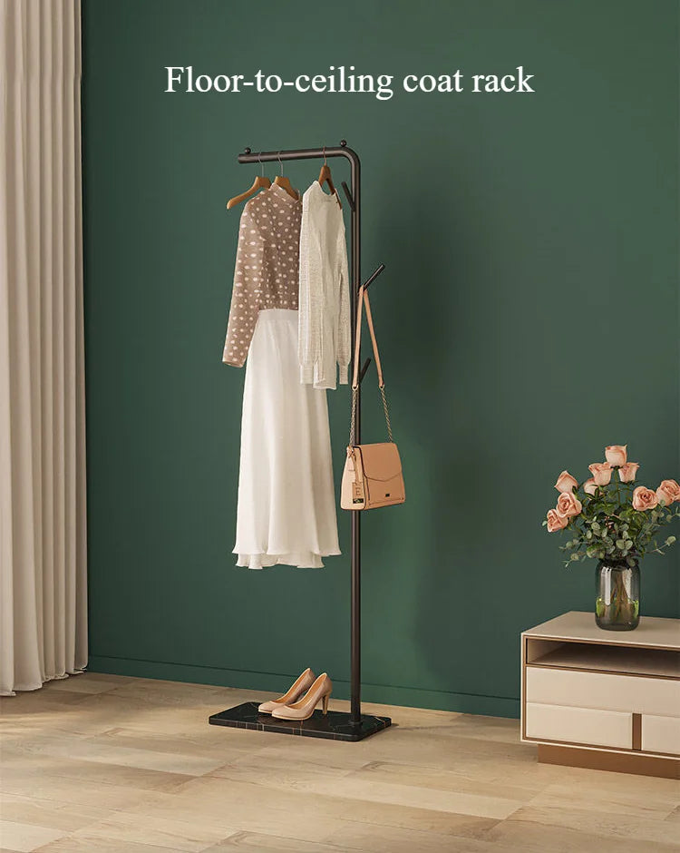 Space-Saving Gold Clothes Rack. Modern Home Organiser