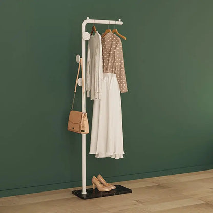 Space-Saving Gold Clothes Rack. Modern Home Organiser